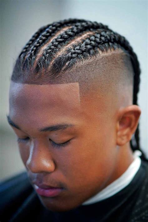 For a more modern look, try cornrow braids with a fade. This style is a great way to keep hair out of the face while adding a touch of style. 2. Knotless Box Braids With Fade. Box Braids are a popular cornrow hairstyle for boys that can be achieved by creating a series of small, neat braids.